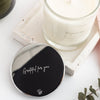 close up of engraved candle lid