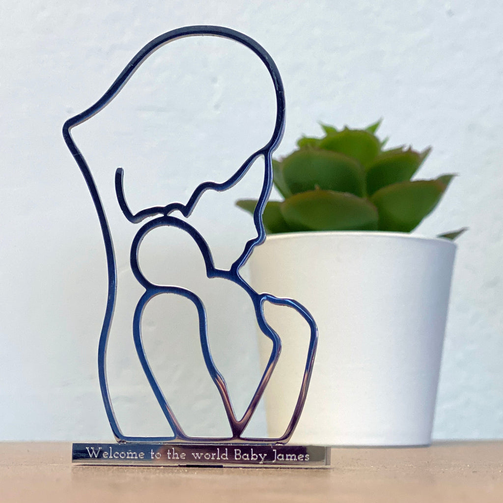 Close up of new baby keepsake with personalised engraving
