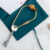 Crystal donut keyring with tigers eye, yellow jade and rose quartz