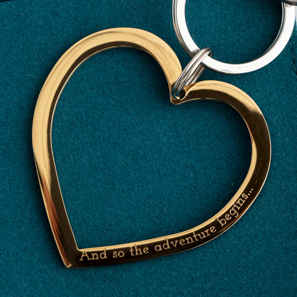 close up of personalised engraving on gold heart keyring